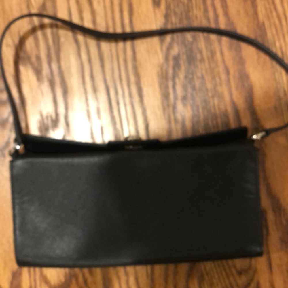 Salvatore Ferragamo black leather clutch